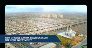 Aerial view of Bahria Town Karachi, showcasing a sprawling residential area with modern buildings and a mosque.