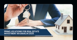 A person holding a house key with a model house and paperwork on a table, promoting real estate investment in Karachi for 2025.